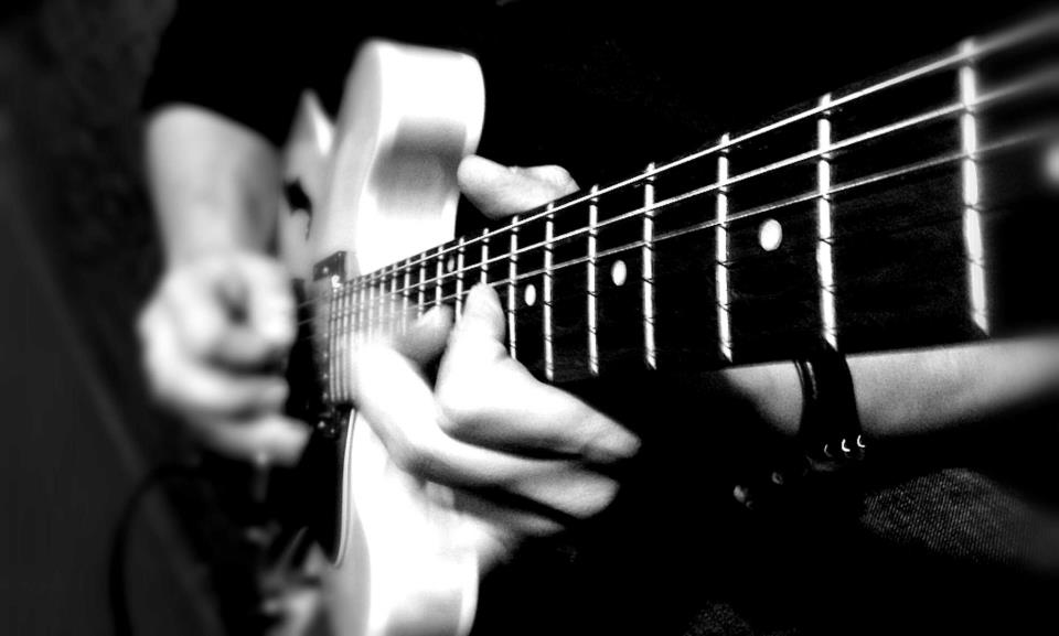 will professionally record guitars over your song